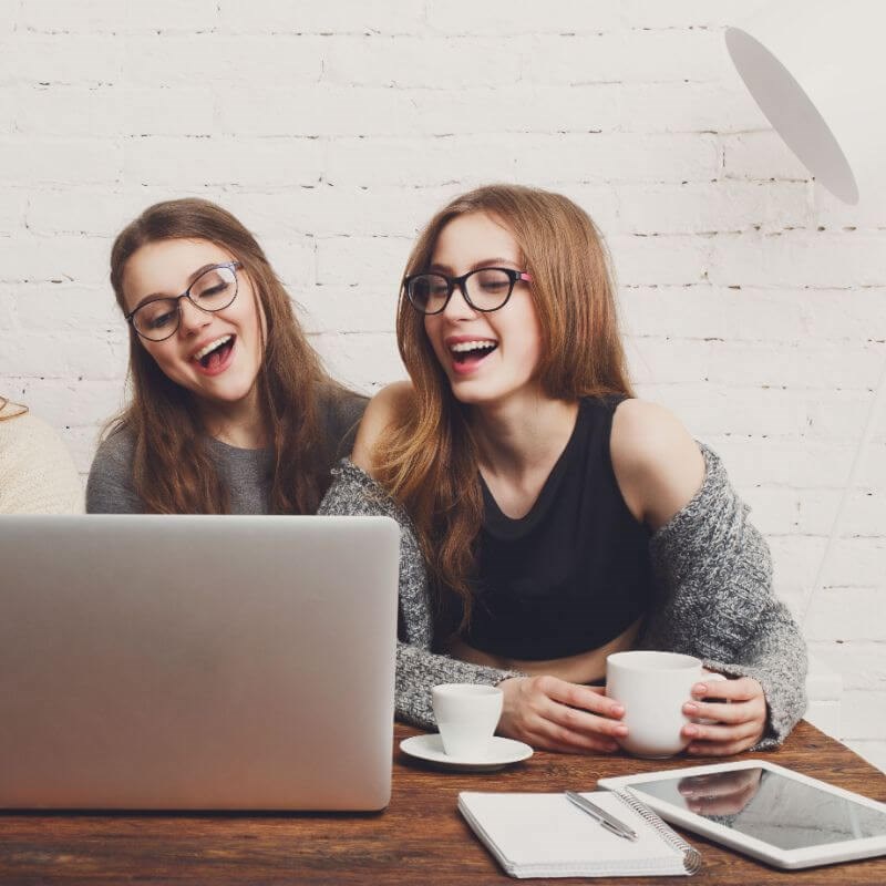 Two girls laughing
